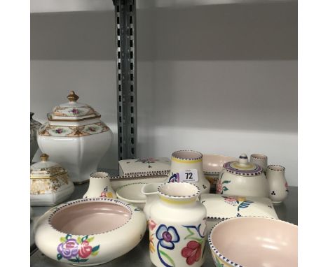 A quantity of various white bodied Poole Pottery items.