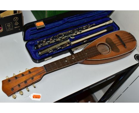 AN OTTO GROH TRAVEL MANDOLIN, an Evette flute with pitted chrome finish and case and a box containing a K &amp; M instrument 