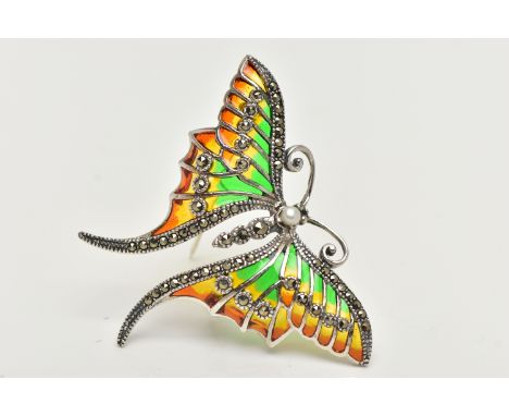 A WHITE METAL PLIQUE A JOUR BROOCH, in the form of butterfly with red, green and yellow enamel wings, marcasite and imitation