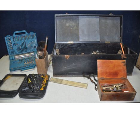 A WOODEN TOOLBOX containing tools such as screwdrivers, chisels, hammers, small socket/driver set, drill bit set etc