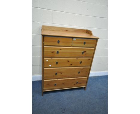 A PINE IKEA CHEST OF TWO SHORT OVER FOUR GRADUATED DRAWERS, with a raised back, width 95cm x depth 50cm x height 128cm (condi