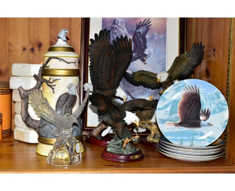 A COLLECTION OF BALD EAGLE ORNAMENTS AND COLLECTOR'S PLATES, comprising an Italian RCR  mantel clock in the form of a Bald Ea