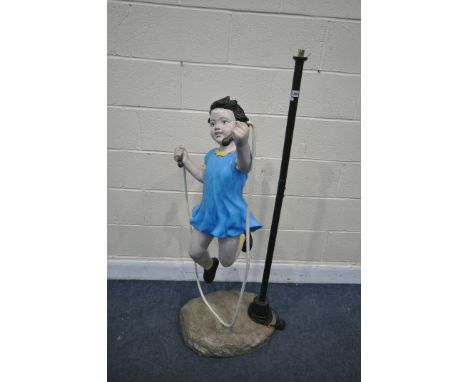 A VINTAGE STANDARD LAMP, of a girl skipping, height of lamp 138cm x height of girl 116cm (condition - distressed due to paint