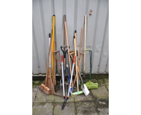 A COLLECTION OF GARDEN TOOLS to include spades, brushes, forks, loppers etc