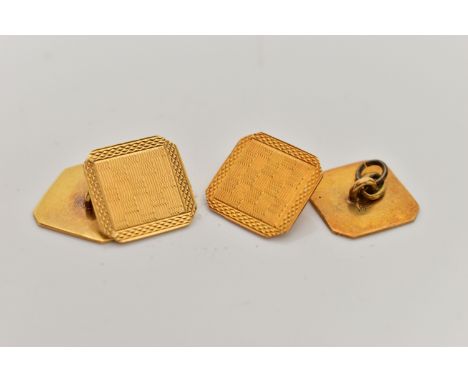 A PAIR OF YELLOW METAL CUFFLINKS, square shape with  cut off corners, engine turned pattern, fitted with chain links, stamped