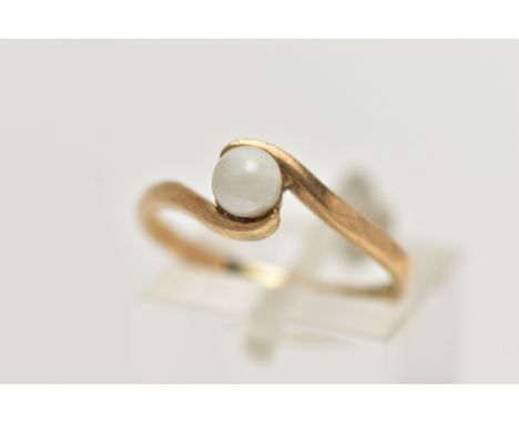 A 9CT GOLD SINGLE PEARL RING, set with a single cultured pearl, between crossover shoulders, leading onto a polished band, ha