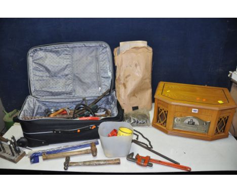 A QUANTITY OF TOOLS to include hammers, holesaw bits, drill bits, hand drill, small quantity of gaskets all inside a suitcase