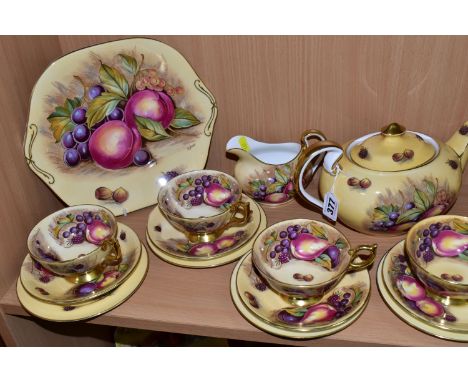 AN AYNSLEY 'ORCHARD GOLD' GILDED TEA SET, comprising a teapot signed D. Jones (large crack along the base), milk jug signed D