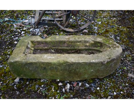 AN ANTIQUE SANDSTONE GOTHIC SHAPED ARCHITECTURAL ITEM, with a recessed centre, width 31cm x 71cm x height 18cm (provenance:-r
