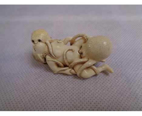 Unusual Meiji Period ‘The Dream of the Fishermans Wife’ Ivory Netsuke finely carved and signed, Length 6.5cm Condition - Good