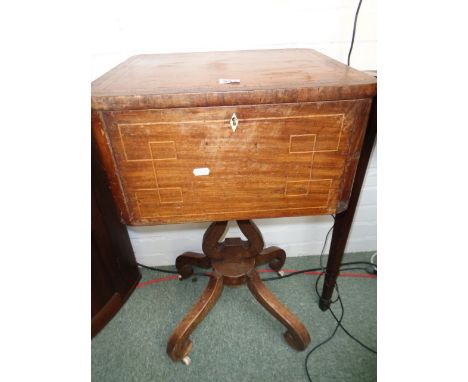 Edwardian Sewing box of stained beech wood with walnut inlay and Ivory escutcheon supported on tripod base and ceramic caster