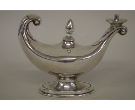 A silver 'Aladdins Lamp' table cigar lighter, by A J Zimmerman Ltd,&nbsp;London 1910, 10.5cm high, 112.5g. 