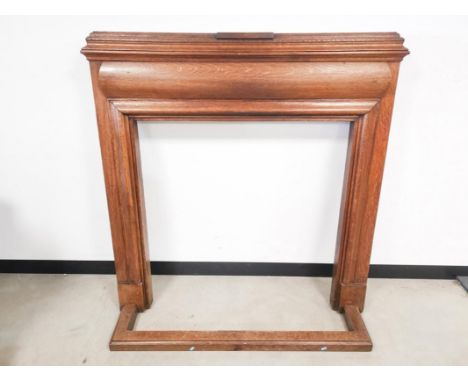 Early 20th Century oak mantel fire surround, 133cm W x 134cm H x 15cm D (internal dimensions 96.5cm W x 97cm H), together wit