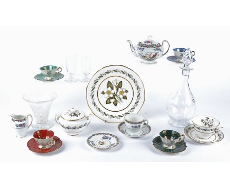 A 20th Century glass decanter of ovoid form with outwardly raised pools and textured stopper,   on a circular foot, the base 
