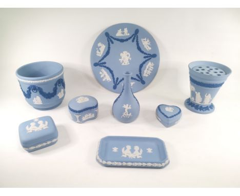 A small assortment of Wedgwood jasperware, to include a cache pot with relief moulded decoration of swags of fruiting grape v