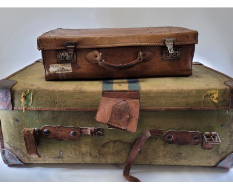 Two vintage trunks to include one green example by 'Tom Hill' of Sloane Square,  31cm x 50cm x 84cm and a tan leather example