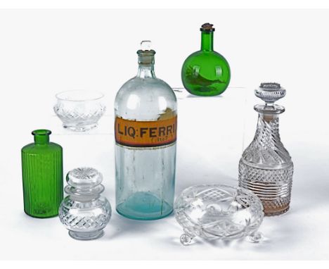 A clear glass pharmaceutical type bottle of substantial proportions labelled 'Liq:Ferri.Iod: 1 to 7',   height 35cm, together