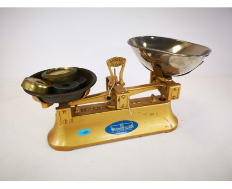A set of 20th Century Wedderburn of Southampton retail scales, with an assortment of weights, height 21cm 