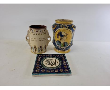 An Italian Maiolica tin glazed pottery alberro style jar pharmaceutical jar with two cartouches of Renaissance figures in pro