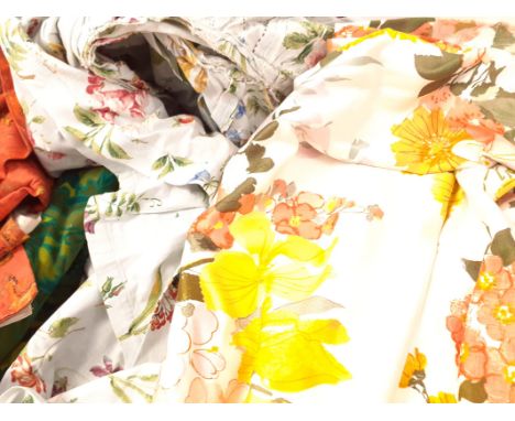 Five different designed lengths of vintage mid 20th Century fabrics to include a 1960's/1970's green geometric print,   and a