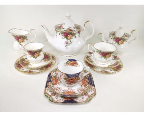 A quantity of Royal Albert tea wares in the 'Old Country Roses' pattern, to include two teapots in graduated sizes, tea cups,