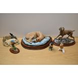 A Border Fine Arts study, modelled resting Great Dane signed E. Waugh sold alongside 'Moses with