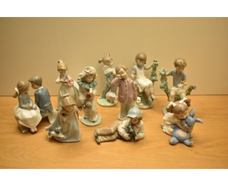 An assortment of Nao by Lladro porcelain figurines comprising 'First Love' No 1136, 'Girl Running with Puppy' No 1027 and 'Gi