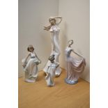 A group of three Lladro and Nao by Lladro porcelain figures comprising 'Dancer' number 5050, 'How