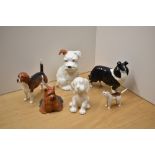 A small collection of Beswick Pottery dog studies, comprising Sheepdog (large) number 1792 in