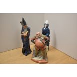 A group of three Royal Doulton figurines comprising 'Falstaff' HN 2054, 'The Wizard' HN 2877 in matt