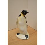 A Poole Pottery penguin study,measures 22cm tall.