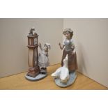 A Lladro porcelain figure 'Bed Time' number 5347 sold alongside A Nao by Lladro 'Girl With Geese'.
