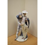 A Lladro porcelain figure group 'Carnival Companions' number 6195, stands at 31cm tall.