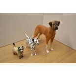 A Royal Doulton bone china Dalmatian HN1114 sold together with a Beswick Pottery study of a Cairn