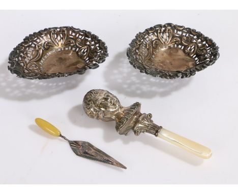 Silver, various dates and makers, to include baby rattle with childs head handle, book mark in the form of a trowel, two pier