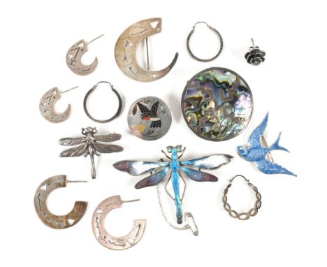 A collection of silver earrings and brooch pins. The lot to include two pairs of hallmarked silver pierced half hoop earrings