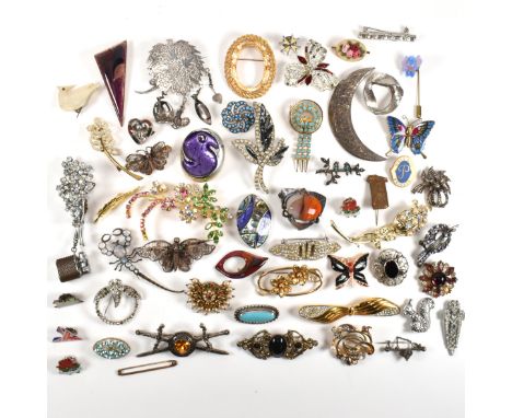 A collection of brooches, dress clips and stick pins. The large collection to include an Edwardian hallmarked Scottish silver