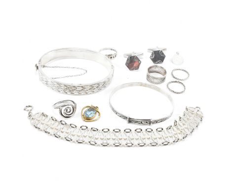 A collection of silver jewellery. The jewellery to include a hallmarked silver hinged bangle with engraved design, hallmarked
