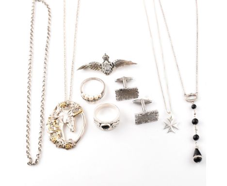 A collection of silver jewellery. The lot to include a hallmarked silver horse pendant strung on a silver fancy link chain ne