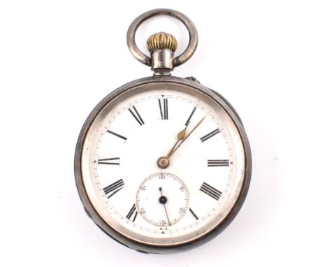 A Victorian hallmarked silver pocket watch. The silver pocket watch having a white dial with Roman numerals, spade hands and 