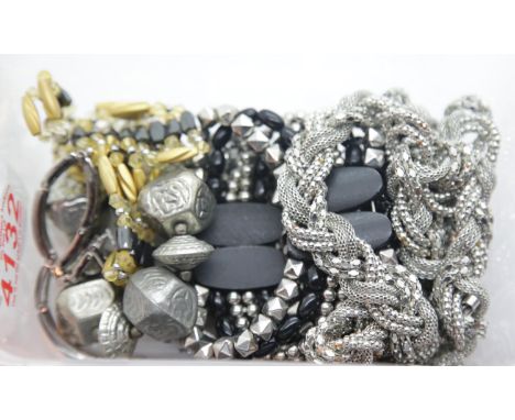Box of mixed bangles, bracelets and a white metal belt. P&amp;P Group 1 (£14+VAT for the first lot and £1+VAT for subsequent 