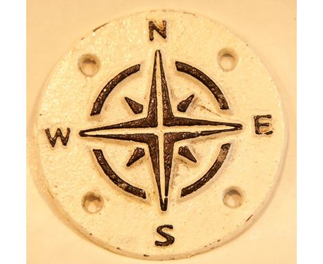 Circular cast iron compass points sign, D: 9 cm. P&amp;P Group 1 (£14+VAT for the first lot and £1+VAT for subsequent lots) 