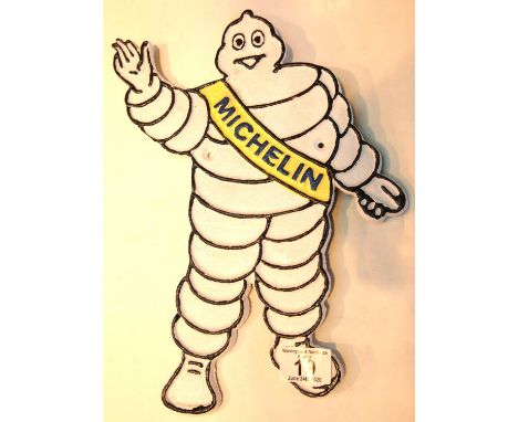 Cast iron Michelin Man sign, H: 34 cm. P&amp;P Group 2 (£18+VAT for the first lot and £2+VAT for subsequent lots) 