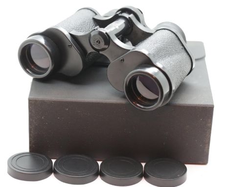 Pair of cased Super Zenith 8x30 field 7.5 degrees binoculars. P&amp;P Group 1 (£14+VAT for the first lot and £1+VAT for subse