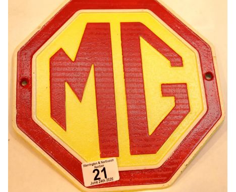 Cast iron MG Motors wall sign, H: 24 cm. P&amp;P Group 2 (£18+VAT for the first lot and £2+VAT for subsequent lots) 