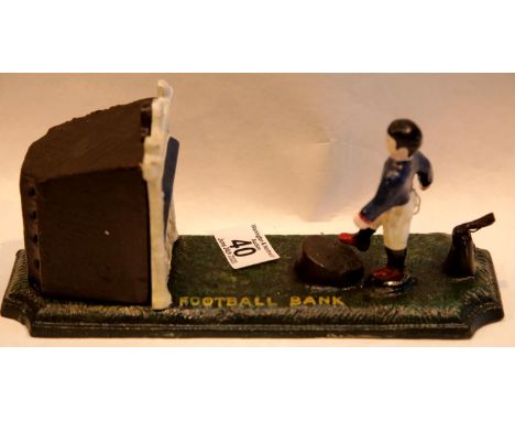 Cast iron football moneybox, L: 25 cm. P&amp;P Group 2 (£18+VAT for the first lot and £2+VAT for subsequent lots) 