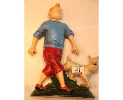 Cast iron Tin Tin and dog doorstop, H: 30 cm. P&amp;P Group 2 (£18+VAT for the first lot and £2+VAT for subsequent lots) 