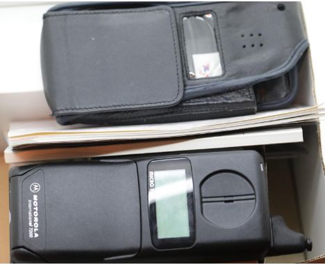 Boxed retro Motorola digital cellular telephone micro TAC with instructions and charger untested. P&amp;P Group 2 (£18+VAT fo