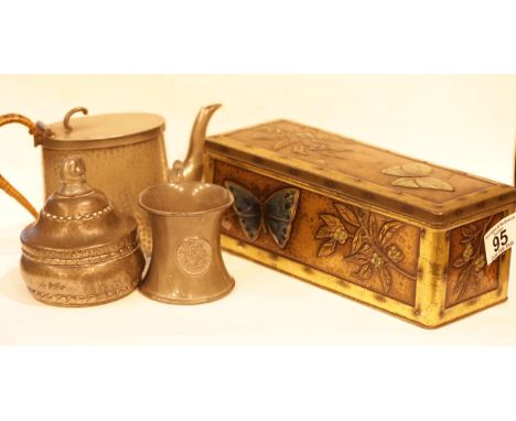 Three pewter items including a jewellery casket and an early 20thC biscuit tin. P&amp;P Group 2 (£18+VAT for the first lot an