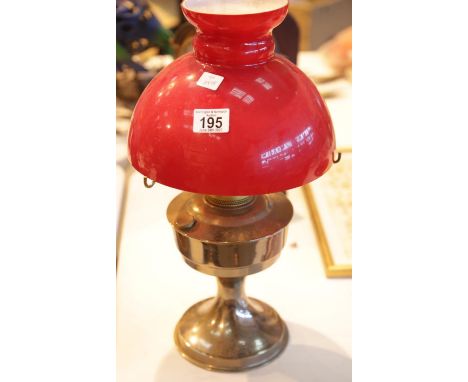 Large vintage oil lamp with red glass shade, H: 60 cm. This lot is not available for in-house P&amp;P. 